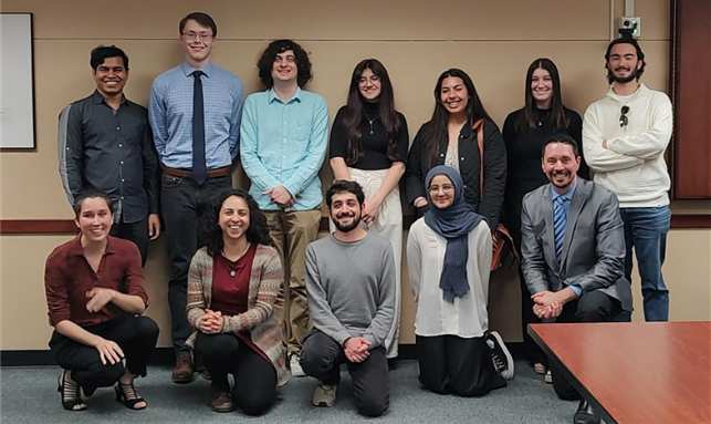 Group of students from research showcase indoors